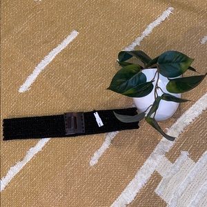 Beaded belt with wooden clamp